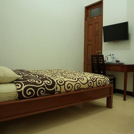 Puri Kusuma Guest House Табанан Номер фото