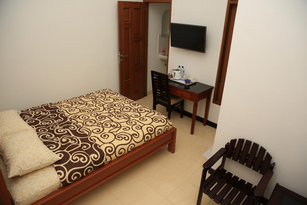Puri Kusuma Guest House Табанан Номер фото